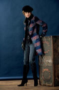 Gill Bret autumn 2006 - This long luxurious jacquard jacket in midnight blue and brick red with a fake fur collar is a real eye-catcher when combined with a fine black polo neck jumper and casual dark denim jeans 